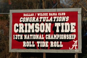 Alabama sign with red background and white letters.