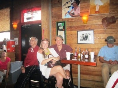 Four people sitting at a table.