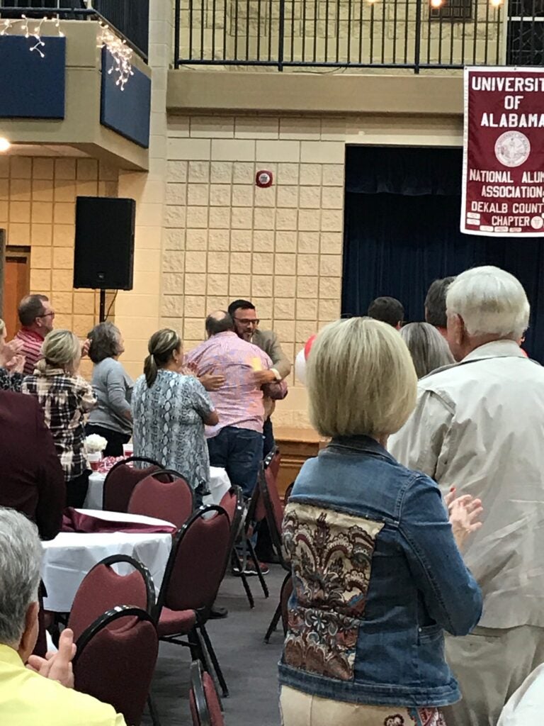Group of people sitting at tables