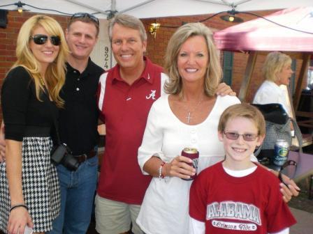 Group of people standing outside.