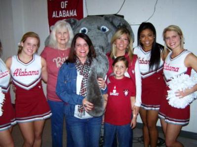 Group of people standing in room with Big AL