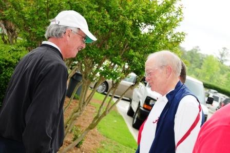 Group of people standing outside.
