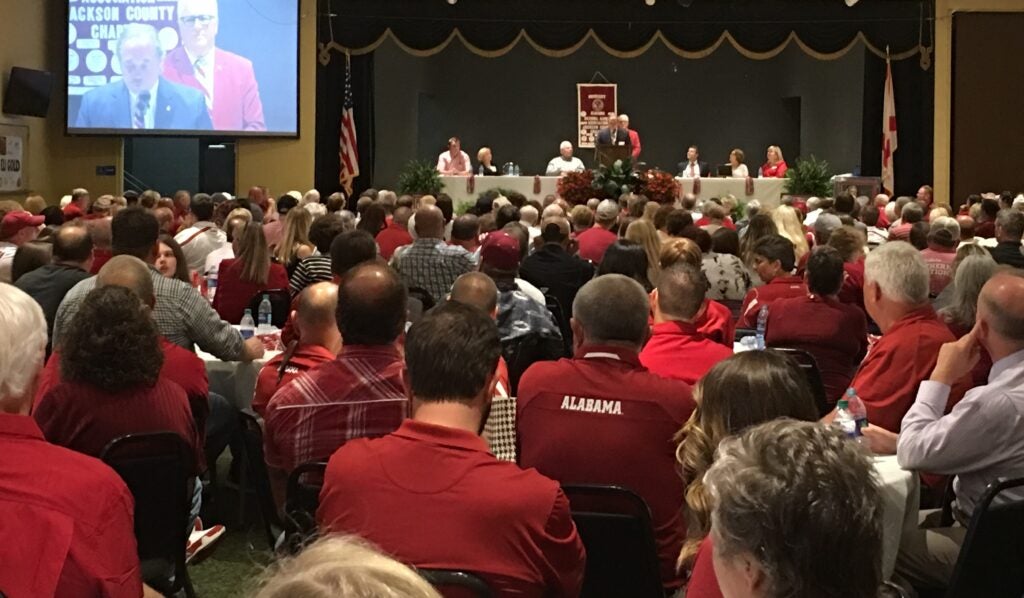group of people sitting at tables