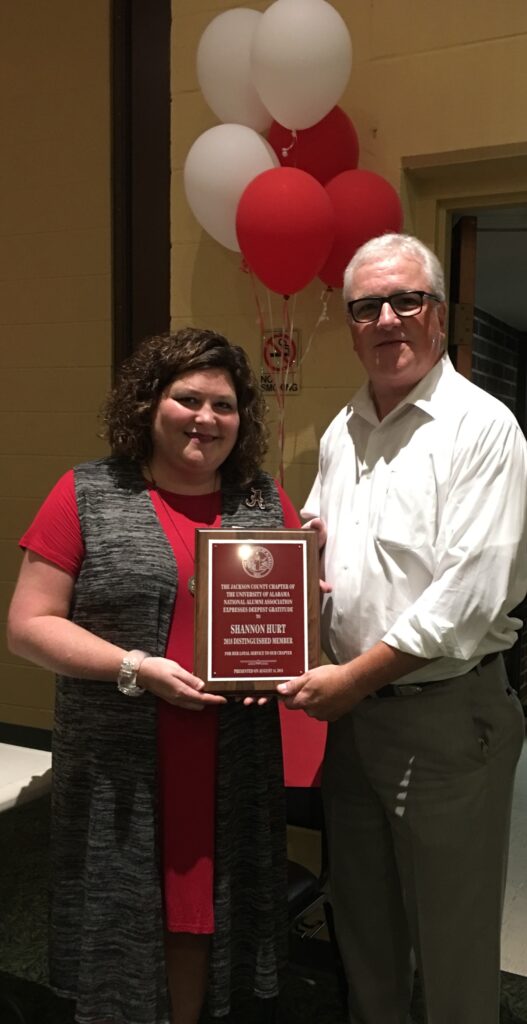 Rick Roden presenting award to studen