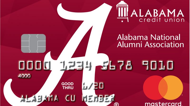 A red credit card with the walking A in the background