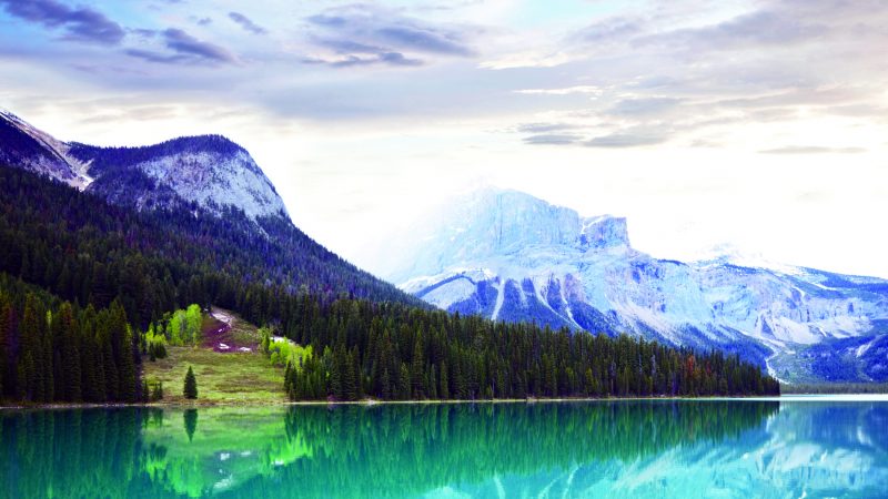 A view of the Canadian Rockies from across a lake