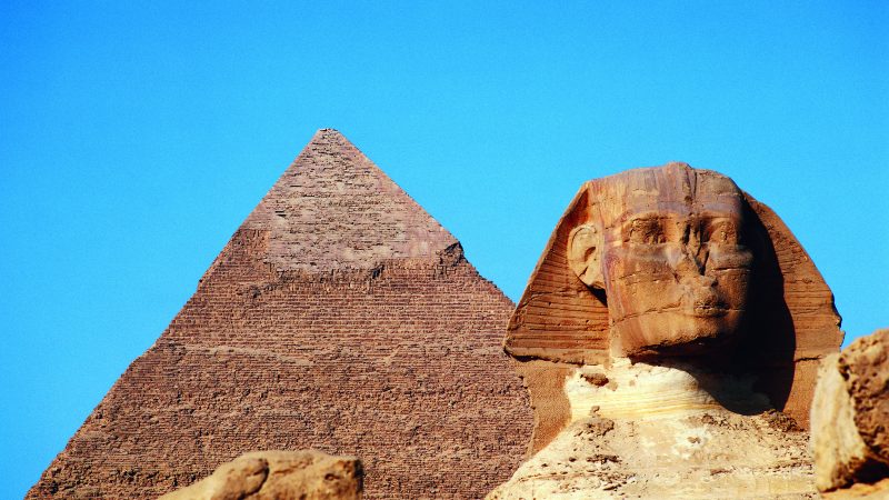 A pyramid and the Sphinx on a bright cloudless day