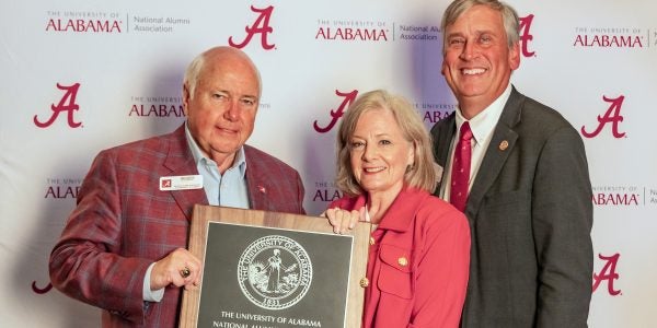 Three UA alumni, two are holding a Distinguished Alumni Award